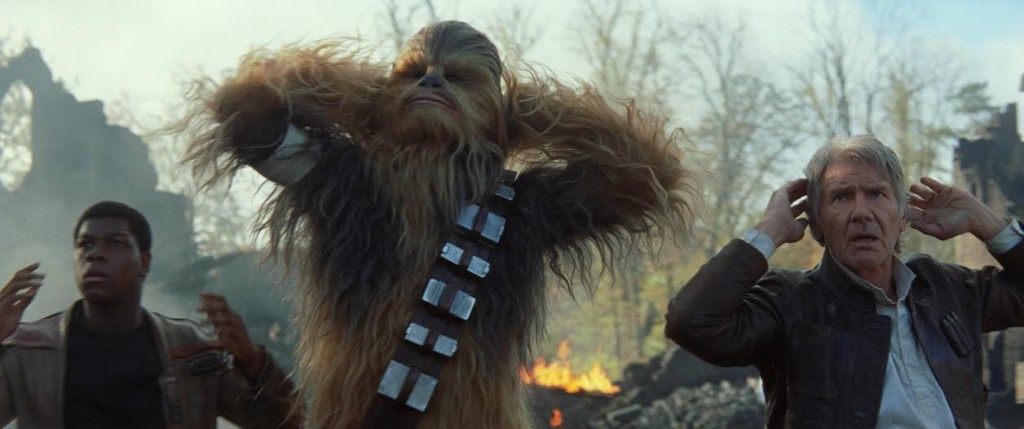 Star Wars: The Force Awakens..L to R: Finn (John Boyega), Chewbacca (Peter Mayhew), and Han Solo (Harrison Ford)..Ph: Film Frame..© 2014 Lucasfilm Ltd. & TM. All Right Reserved..