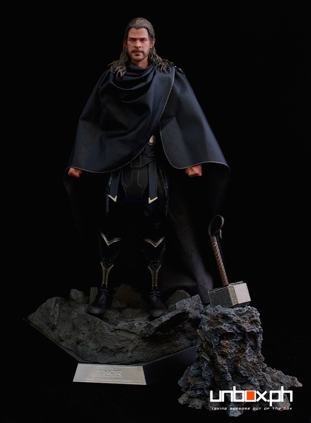 Together with the hammer and rock from the first Thor figure.
