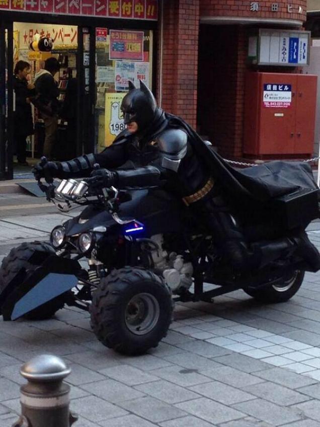 ChiBatman cruising the streets with his trust "BatPod" Trike. 