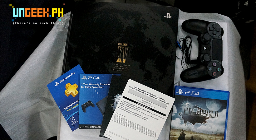 Inside the box. Beautifully designed PS4 and controller, game and various DLCS.