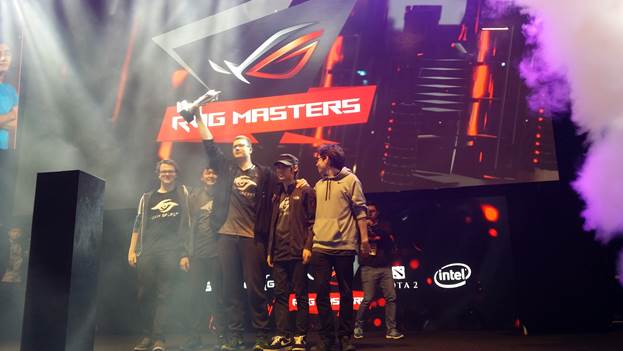 Puppey holds the ROG Masters trophy up high as they take the grand finals with a vengeance!